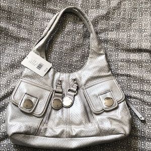 Silver faux-snake skin purse. Never been used!